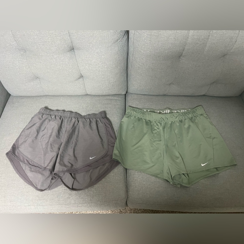 3 Pairs of athletic shorts. 2 Nike and 1 Underamour.
